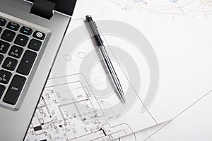 Workplace of architect - Architectural project, blueprints, rolls and tablet, pen, divider compass on plans. Engineering