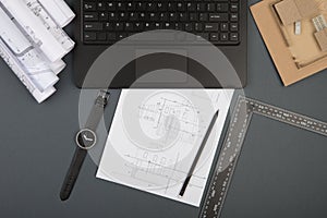 Workplace of architect - construction drawings, scale model and tools