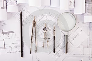 Workplace of architect - construction drawings and tools