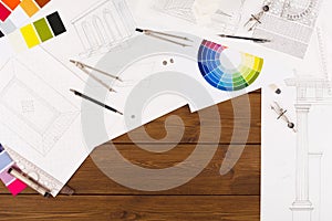 Architectural project, engineering tools on table.