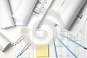 Workplace of architect - rolls and plans.