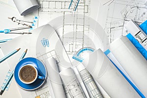 Workplace of architect - rolls and plans.