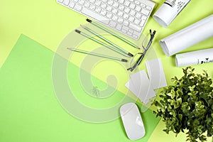 Workplace of architect - rolls and plans. Construction background.