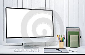 workplace background for designers with Blank white screen modern desktop computer.
