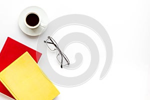 Workplace with books, glasses, coffee on white background flatlay mockup