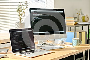 Workplace with computers in office