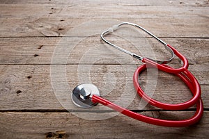 Workplace of a doctor - Stethoscope on the wooden desk