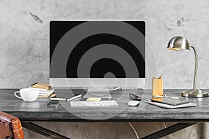 Workplace with empty computer display front