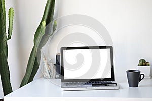 Workplace mockup concept. Mock up home decor laptop computer and
