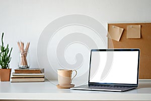 Workplace mockup concept. Selective focus Mockup home decor laptop computer and office object with copy space for products