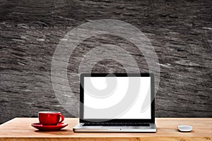 Workplace with notebook laptop and coffee cup  work table.