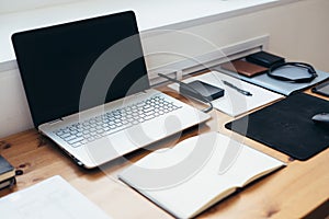 Workplace in office space. Work desk accessories