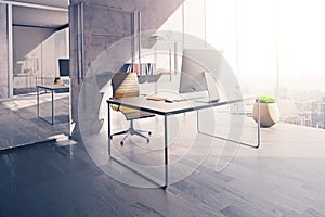 Workplace in sunlit office