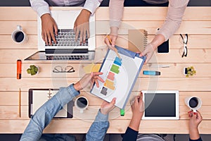 Workplace top view. Business partners discussing project