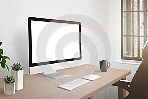 Workroom desk with computer display with isolated screen for mockup