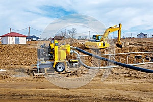 Works on the installation of a dewatering system in the open air with a pump