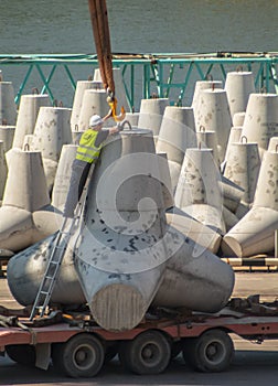 Works in the port. Breakwater from tetrahedra photo