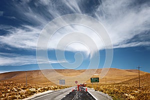 Works on the road before arriving at the Valley of Happiness near Cariquima and Colchane in the Tarapaca region, Chile photo