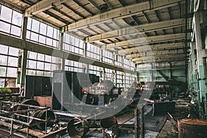 Workshop of abandoned metallurgical factory inside interior with equipment