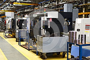 Workshop of a automotive factory with automatic CNC turning machines.