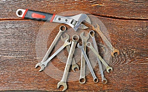 Workshop bench. Variety of hand tools on a wooden table, top view, copy space