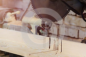 Workshop of Cabinetmaker Carpenter - Working with Wood. Electric Backsaw with Copyspace.