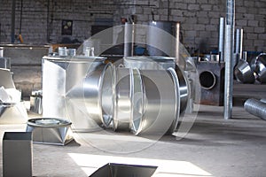 Workshop in the factory for the manufacture of ventilation pipes photo