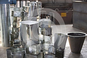 Workshop in the factory for the manufacture of ventilation pipes photo