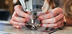 Workshop sewing machine, woman hands and fashion designer with button and thread work. Small business, entrepreneur and