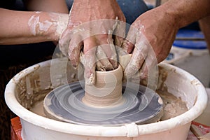 Workshop of ukrainian traditional handmade ceramic pots on the wheel