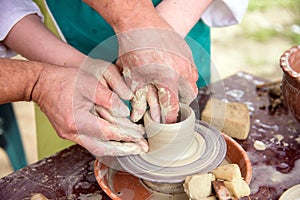 Workshop of ukrainian traditional handmade ceramic pots on the wheel