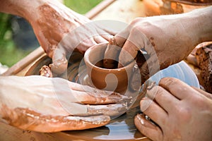 Workshop of ukrainian traditional handmade ceramic pots on the wheel