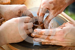 Workshop of ukrainian traditional handmade ceramic pots on the wheel