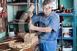Workshop where the cabinetmaker carving wood photo