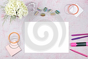 Workspace with computer, bouquet Hydrangeas, clipboard. Women`s fashion accessories isolated on pink background. Flat