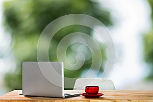 Workspace with computer, keyboard, coffee cup and Mouse with Blank or White Screen Isolated is on the work.