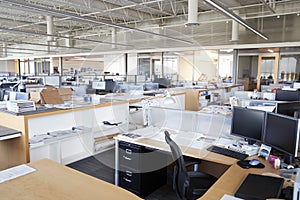 Workstation in abandoned open plan office photo