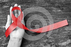 World aids day and national HIV AIDS and aging awareness month concept with red ribbon (isolated with clipping path)