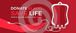 World blood donor day, Donate blood save live - The donated blood is taken from the donor red arm into bag on red background