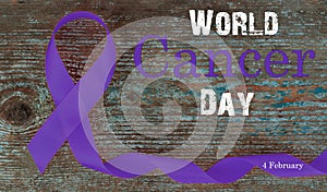 World Cancer Day concept. Lavender Ribbon on wooden background