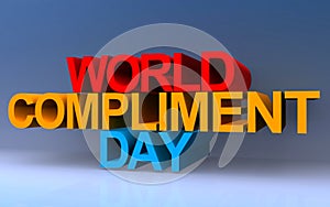 world compliment day on blue photo