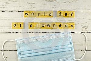 world day of slowness.words from wooden cubes with letters