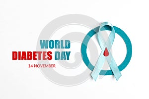 World Diabetes Day banner with a blue circlel, ribbon and drop of blood as a symbol of diabetes on a white background.