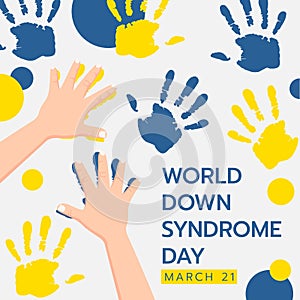 World down syndrom day banner with child hand doing yellow and blue hand paint abstract background vector design photo