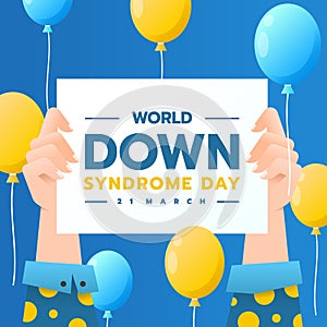 World Down Syndrome Day - hand hold up paper with text and yellow and ble balloon around vector design photo