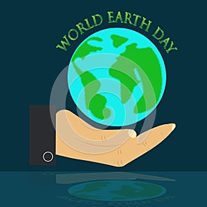 World Earth Day with Earth on the hand environment conservation concept on grey reflection background