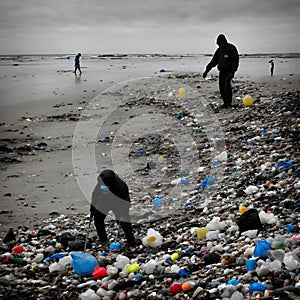 World Earth Day a single person cleaning up a polluted beach