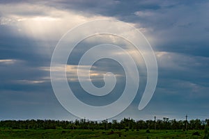 World environment day concept: Dramatic valley sky with sun rays for panoramic landscape background