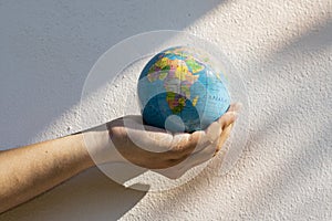 World Environment Day. Human  hand protect earth globe. Save Earth