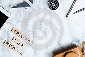 World Explorer blogger accessories on luxury white marble table